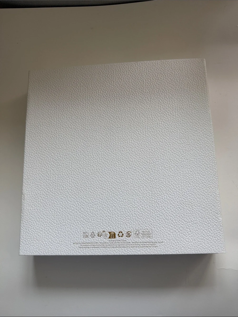 A Large Textured Christian Dior Gold Logo Gift Box With Ribbon Side Closure